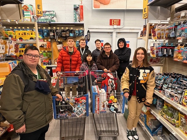 Project Search students with gifts in their shopping carts